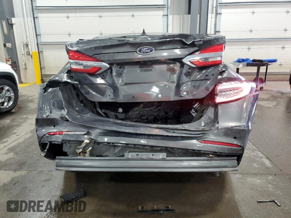 2019 Ford Fusion Hybrid SE with VIN 3FA6P0LU9KR287187, listed as a Copart auction lot 52704565 with 52,543 mi miles and Salvage Title. Bid and sale history available at carsss.com. Image 6.