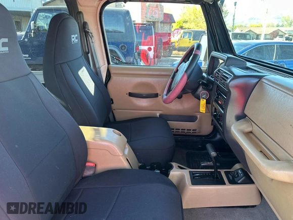 2002 Jeep Wrangler Sport with VIN 1J4FA49S32P765579, listed as a Copart auction lot 55244845 with 127,791 mi miles and Clean Title. Bid and sale history available at carsss.com. Image 5.