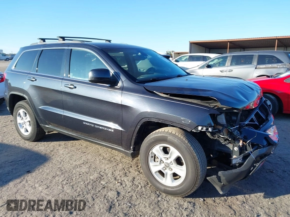 2014 Jeep Grand Cherokee Laredo with VIN 1C4RJEAG3EC218128, listed as a IAAI auction lot 40951611 with 119,596 mi miles and . Bid and sale history available at DreamBid. Image 1.