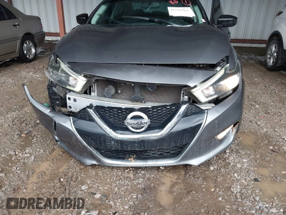 2018 Nissan Maxima Platinum z VIN 1N4AA6AP4JC390235, wystawiony jako IAAI lot #42376364 z przebiegiem 152 293 mil mil oraz . Historia ofert i sprzedaży dostępna na DreamBid. Obrazek 6.
