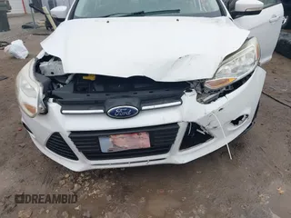 2013 Ford Focus SE with VIN 1FADP3F25DL221207, listed as a IAAI auction lot 41209646 with 160,125 mi miles and . Bid and sale history available at DreamBid. Image 6.
