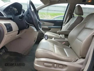 2014 Honda Odyssey Touring z VIN 5FNRL5H97EB508649, wystawiony jako Copart lot #55665245 z przebiegiem 162 892 mil mil oraz Czysty tytuł • Clean title. Historia ofert i sprzedaży dostępna na DreamBid. Obrazek 7.