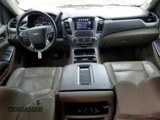 2018 Chevrolet Suburban Premier with VIN 1GNSCJKC5JR293962, listed as a Copart auction lot 50641835 with 137,598 mi miles and Salvage Title. Bid and sale history available at DreamBid. Image 8.