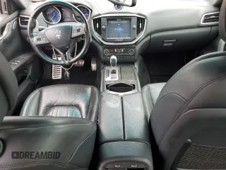 2014 Maserati Ghibli S Q4 with VIN ZAM57RTA7E1128937, listed as a Copart auction lot 54492205 with 79,897 mi miles and Salvage title. Bid and sale history available at DreamBid. Image 8.