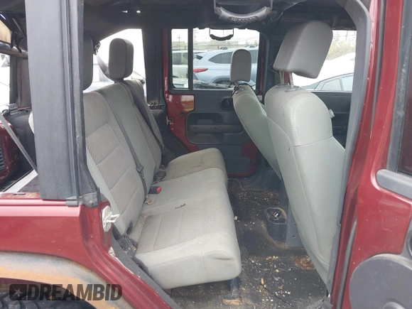 2007 Jeep Wrangler Unlimited Sahara with VIN 1J4GA59177L162022, listed as a IAAI auction lot 41887599 with 207,358 mi miles and . Bid and sale history available at DreamBid. Image 8.
