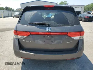 2014 Honda Odyssey Touring with VIN 5FNRL5H93EB061754, listed as a Copart auction lot 55182015 with 168,058 mi miles and Salvage title. Bid and sale history available at DreamBid. Image 6.