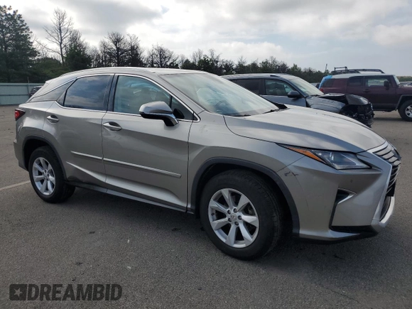 2017 Lexus RX 350 with VIN 2T2BZMCA2HC114007, listed as a Copart auction lot 63587985 with 61,421 mi miles and Salvage title. Bid and sale history available at DreamBid. Image 4.