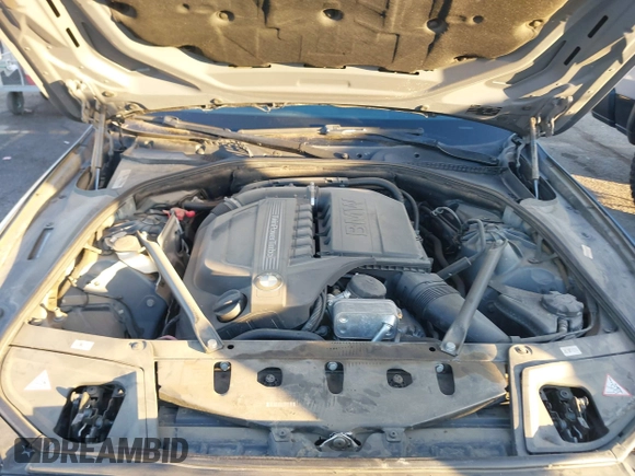 2014 BMW 5 Series 535i with VIN WBA5B1C54ED479873, listed as a IAAI auction lot 41338061 with 75,097 mi miles and . Bid and sale history available at DreamBid. Image 10.