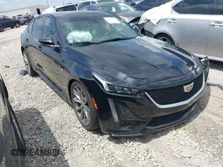 2020 Cadillac CT5 Sport z VIN 1G6DP5RK7L0154923, wystawiony jako IAAI lot #42177217 z przebiegiem 57 329 mil mil oraz . Historia ofert i sprzedaży dostępna na DreamBid. Obrazek 1.
