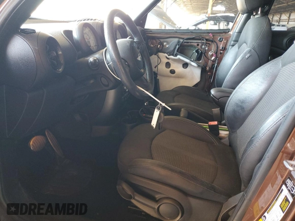 2014 MINI Countryman S with VIN WMWZC3C53EWP27805, listed as a Copart auction lot 56984385 with 78,251 mi miles and Salvage title. Bid and sale history available at DreamBid. Image 7.