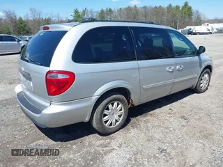 2006 Chrysler Town & Country LWB Touring with VIN 2A4GP54LX6R844499, listed as a IAAI auction lot 42082846 with 133,091 mi miles. Bid and sale history available at carsss.com. Image 4.