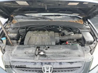 2005 Honda Pilot EX-L z VIN 2HKYF18705H564606, wystawiony jako Copart lot #55747785 z przebiegiem 272 432 mil mil oraz Szkoda całkowita • Salvage title. Historia ofert i sprzedaży dostępna na DreamBid. Obrazek 11.