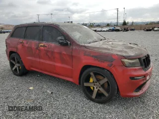 2012 Jeep Grand Cherokee SRT8 with VIN 1C4RJFDJ7CC217641, listed as a Copart auction lot 44060105 with 108,858 mi miles and Salvage Title. Bid and sale history available at carsss.com. Image 4.