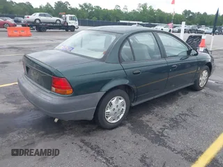 1998 Saturn SL с VIN 1G8ZH5280WZ295857, выставлен на аукционе IAAI как лот 42238789 с пробегом 153 163 миль миль и . История ставок и продаж доступна на DreamBid. Изображение 4.