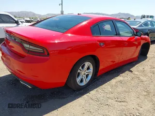 2022 Dodge Charger SXT with VIN 2C3CDXBG0NH255744, listed as a IAAI auction lot 42014648 with 50,354 mi miles and . Bid and sale history available at DreamBid. Image 4.