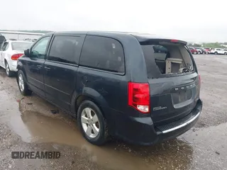2013 Dodge Grand Caravan SE with VIN 2C4RDGBG8DR736291, listed as a IAAI auction lot 42161396 with Not Provided miles and . Bid and sale history available at DreamBid. Image 3.