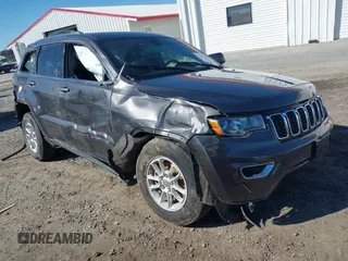 2018 Jeep Grand Cherokee Laredo E with VIN 1C4RJFAG8JC335459, listed as a IAAI auction lot 41850163 with 93,289 mi miles. Bid and sale history available at carsss.com. Image 1.