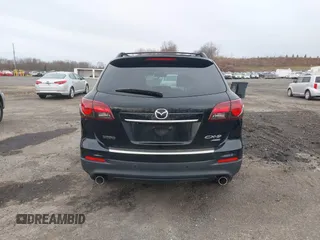 2015 Mazda CX-9 Grand Touring z VIN JM3TB3DV6F0464926, wystawiony jako IAAI lot #42035670 z przebiegiem 168 257 mil mil oraz . Historia ofert i sprzedaży dostępna na DreamBid. Obrazek 16.