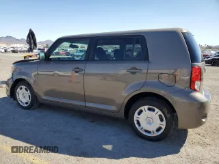 2012 Scion xB with VIN JTLZE4FE6CJ023059, listed as a Copart auction lot 49843555 with 145,371 mi miles and Salvage Title. Bid and sale history available at carsss.com. Image 2.