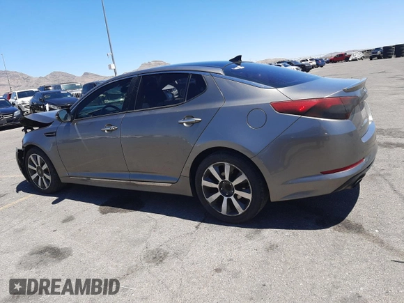 2012 Kia Optima SX z VIN 5XXGR4A60CG044520, wystawiony jako Copart lot #56013155 z przebiegiem 155 487 mil mil oraz Szkoda całkowita • Salvage title. Historia ofert i sprzedaży dostępna na DreamBid. Obrazek 2.
