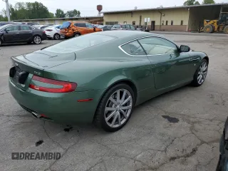 2005 Aston Martin DB9 z VIN SCFAD01A95GA02851, wystawiony jako Copart lot #63535783 z przebiegiem 40 729 mil mil oraz . Historia ofert i sprzedaży dostępna na DreamBid. Obrazek 3.