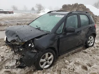 2009 Suzuki SX4 Man FWD with VIN JS2YA413996201623, listed as a Copart auction lot 84094154 with 0 mi miles and Salvage Title. Bid and sale history available at carsss.com. Image 1.