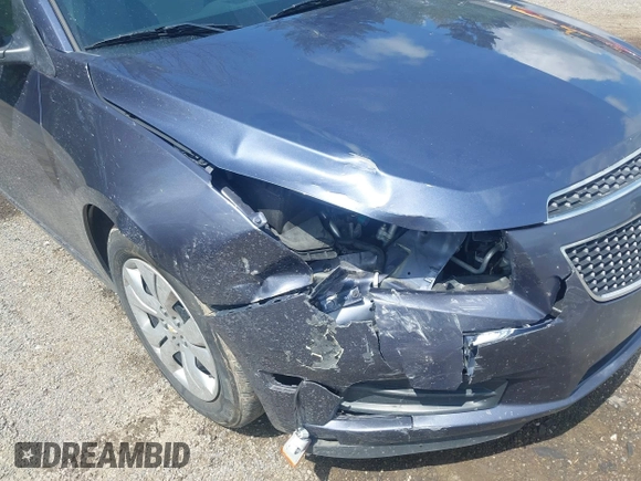2014 Chevrolet Cruze LS with VIN 1G1PA5SG5E7450771, listed as a IAAI auction lot 42214200 with 66,312 mi miles and . Bid and sale history available at DreamBid. Image 6.