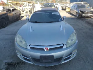 2007 Saturn Sky z VIN 1G8MB35B57Y124617, wystawiony jako Copart lot #76162604 z przebiegiem 140 003 mil mil oraz Szkody całkowita. Historia ofert i sprzedaży dostępna na DreamBid. Obrazek 5.