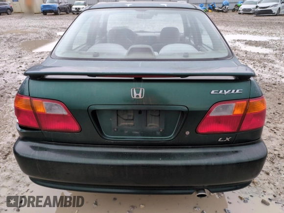 2000 Honda Civic LX with VIN 2HGEJ6676YH512977, listed as a Copart auction lot 50985455 with 242,759 mi miles and Salvage Title. Bid and sale history available at DreamBid. Image 6.