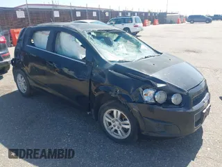 2012 Chevrolet Sonic LT with VIN 1G1JC6SB9C4200197, listed as a IAAI auction lot 42085421 with 124,667 mi miles. Bid and sale history available at carsss.com. Image 1.