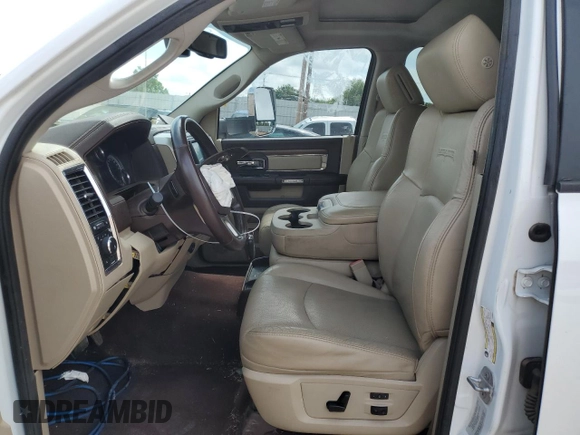 2015 Ram 2500 Laramie with VIN 3C6UR5NL4FG569422, listed as a Copart auction lot 62017655 with 100,400 mi miles and Salvage title. Bid and sale history available at DreamBid. Image 7.