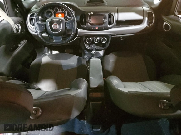 2015 FIAT 500L Easy with VIN ZFBCFABH9FZ030061, listed as a Copart auction lot 55311245 with 101,284 mi miles and Salvage title. Bid and sale history available at DreamBid. Image 8.