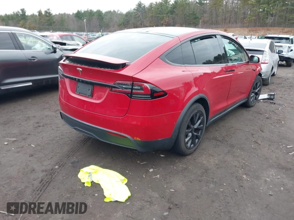 2022 Tesla Model X with VIN 7SAXCBE57NF354843, listed as a IAAI auction lot 41027188 with Not Provided miles and . Bid and sale history available at DreamBid. Image 4.