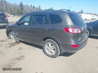 2012 Hyundai Santa Fe GLS with VIN 5XYZGDAB5CG126900, listed as a IAAI auction lot 41781584 with 124,897 mi miles. Bid and sale history available at carsss.com. Image 3.