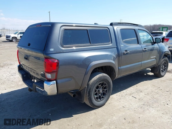 2021 Toyota Tacoma 4WD SR with VIN 3TMCZ5AN7MM442237, listed as a IAAI auction lot 41993450 with 30,148 mi miles. Bid and sale history available at carsss.com. Image 4.