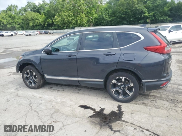 2018 Honda CR-V Touring with VIN 2HKRW2H91JH688325, listed as a Copart auction lot 63619555 with 124,962 mi miles and Salvage title. Bid and sale history available at DreamBid. Image 2.