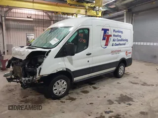 2021 Ford Transit Cargo with VIN 1FTBR1C82MKA29712, listed as a IAAI auction lot 41463781 with 83,961 mi miles and . Bid and sale history available at DreamBid. Image 2.