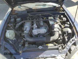2002 Mazda MX-5 Miata Cloth z VIN JM1NB353220222868, wystawiony jako Copart lot #59944345 z przebiegiem 159 595 mil mil oraz Szkoda całkowita • Salvage title. Historia ofert i sprzedaży dostępna na DreamBid. Obrazek 11.