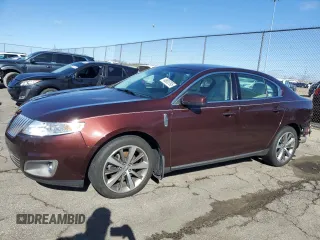 2012 Lincoln MKS with VIN 1LNHL9ER4CG804993, listed as a Copart auction lot 48805795 with 106,131 mi miles and Salvage Title. Bid and sale history available at carsss.com. Image 1.