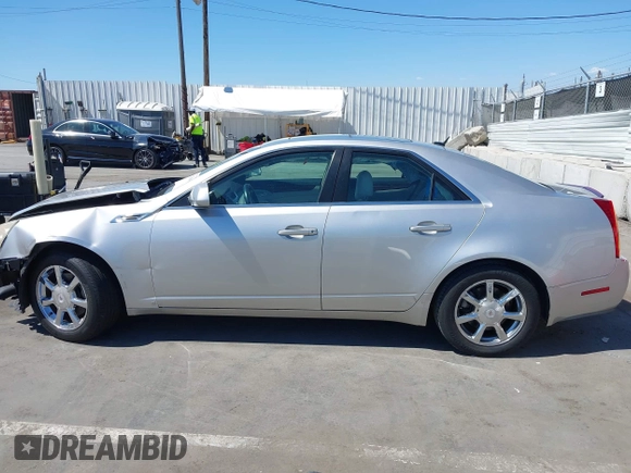 2008 Cadillac CTS RWD with VIN 1G6DM577280111413, listed as a IAAI auction lot 42238643 with 114,706 mi miles and . Bid and sale history available at DreamBid. Image 15.