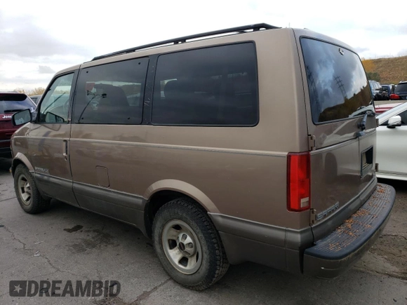 1999 GMC Safari z VIN 1GKEL19W4XB506220, wystawiony jako Copart lot #77257424 z przebiegiem 151 966 mil mil oraz Czysty tytuł • Clean title. Historia ofert i sprzedaży dostępna na DreamBid. Obrazek 2.