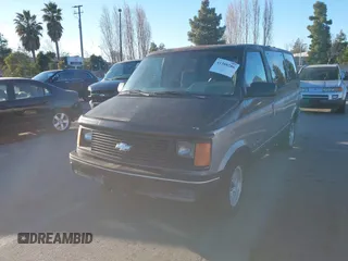 1991 Chevrolet Astro with VIN 1GNDM19Z2MB123653, listed as a IAAI auction lot 41388286 with 175,009 mi miles. Bid and sale history available at carsss.com. Image 2.