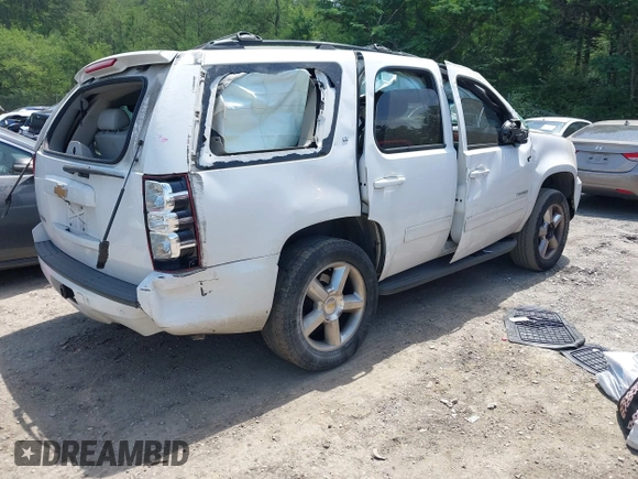 2013 Chevrolet Tahoe LT with VIN 1GNSCBE07DR372979, listed as a IAAI auction lot 42281955 with 214,737 mi miles and . Bid and sale history available at DreamBid. Image 4.