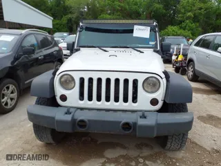 2013 Jeep Wrangler Unlimited Sport with VIN 1C4BJWDG8DL511315, listed as a IAAI auction lot 42004971 with 136,630 mi miles. Bid and sale history available at carsss.com. Image 12.