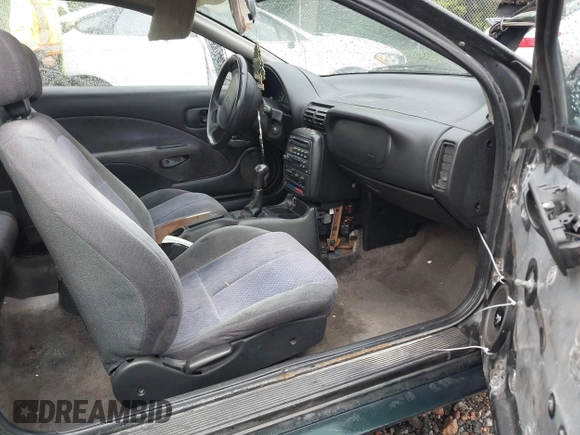 1997 Saturn SC z VIN 1G8ZG1277VZ342397, wystawiony jako IAAI lot #41966570 z przebiegiem 184 054 mil mil oraz . Historia ofert i sprzedaży dostępna na DreamBid. Obrazek 5.