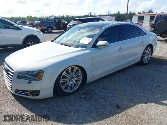 2014 Audi A8 4.0T with VIN WAUR2AFD8EN004371, listed as a IAAI auction lot 42693492 with 159,405 mi miles and . Bid and sale history available at DreamBid. Image 17.