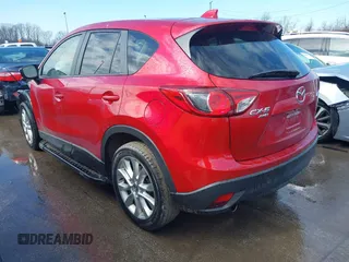 2015 Mazda CX-5 Grand Touring with VIN JM3KE4DY7F0477770, listed as a IAAI auction lot 41617849 with 106,135 mi miles. Bid and sale history available at carsss.com. Image 3.