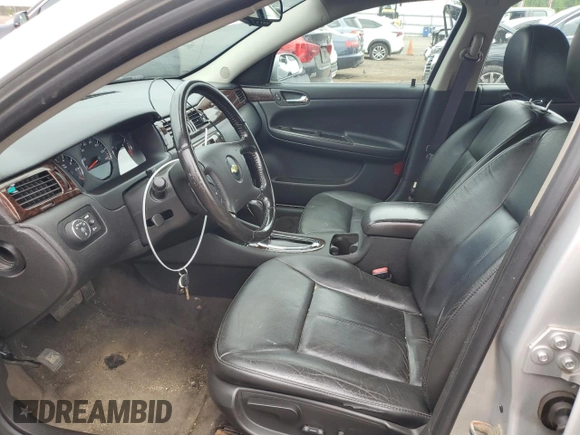 2014 Chevrolet Impala LTZ z VIN 2G1WC5E31E1184046, wystawiony jako Copart lot #62561395 z przebiegiem 207 989 mil mil oraz Czysty tytuł • Clean title. Historia ofert i sprzedaży dostępna na DreamBid. Obrazek 7.