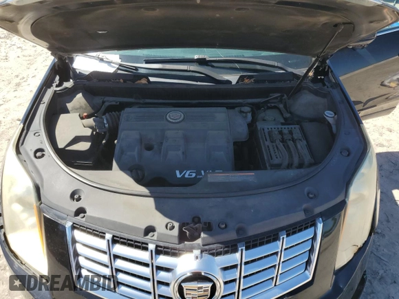 2015 Cadillac SRX Performance Collection z VIN 3GYFNCE37FS576972, wystawiony jako Copart lot #55226495 z przebiegiem 167 977 mil mil oraz Szkoda całkowita • Salvage title. Historia ofert i sprzedaży dostępna na DreamBid. Obrazek 11.