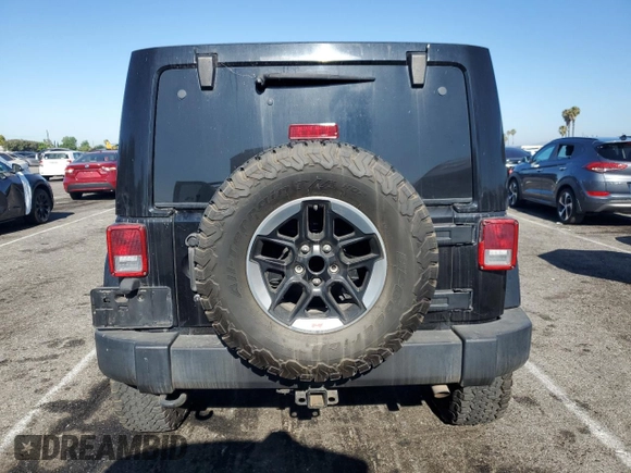 2012 Jeep Wrangler Unlimited Rubicon with VIN 1C4HJWFG9CL276753, listed as a Copart auction lot 62996995 with 234,159 mi miles and Clean title. Bid and sale history available at DreamBid. Image 6.